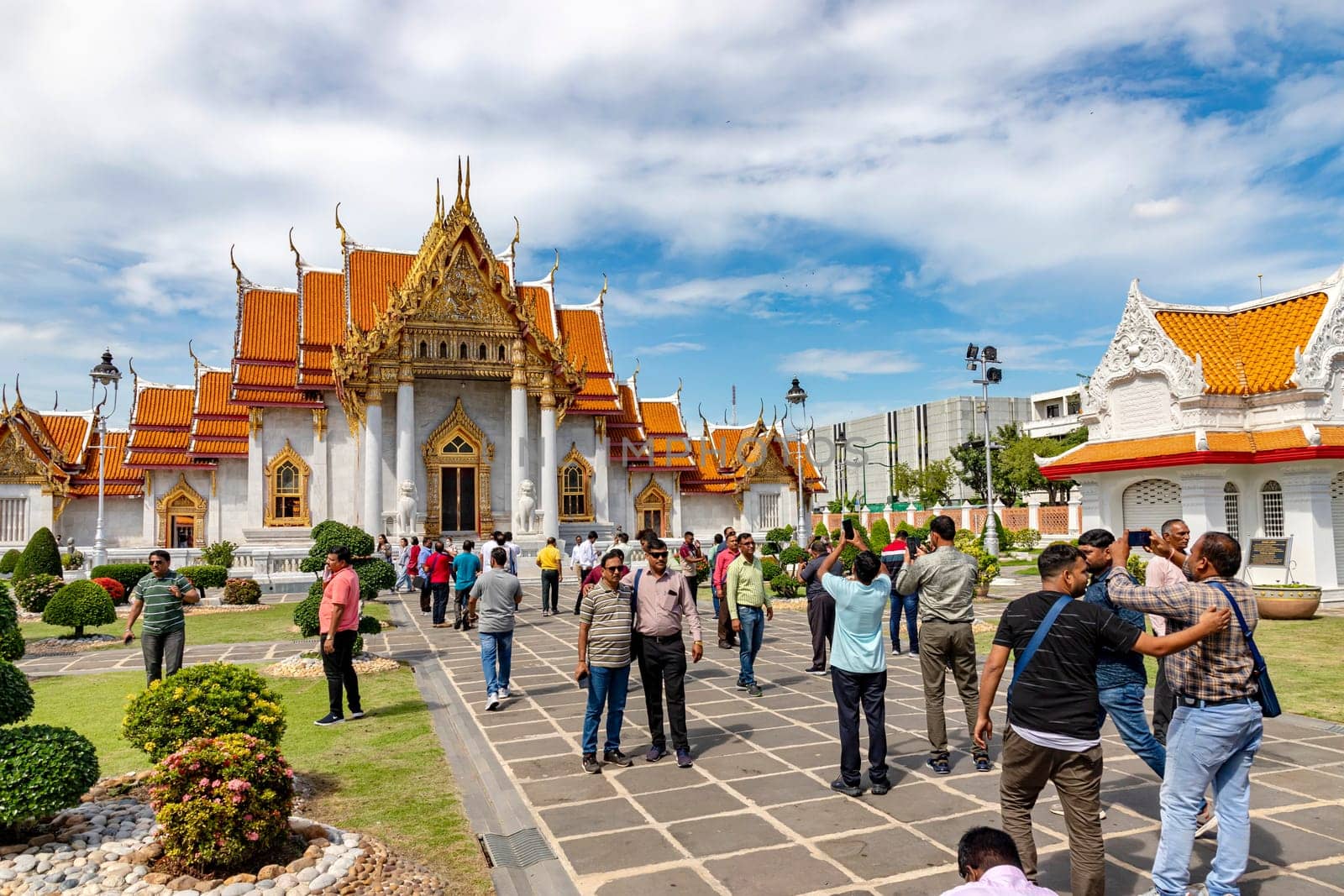 Bangkok, Thailand - Dec 4, 2022 : Many Muslims visiting Wat Benchamabophit Dusitvanaram (also known as the Marble Temple), a major tourist spot in Bangkok It shows that Thailand now welcomes tourists.
