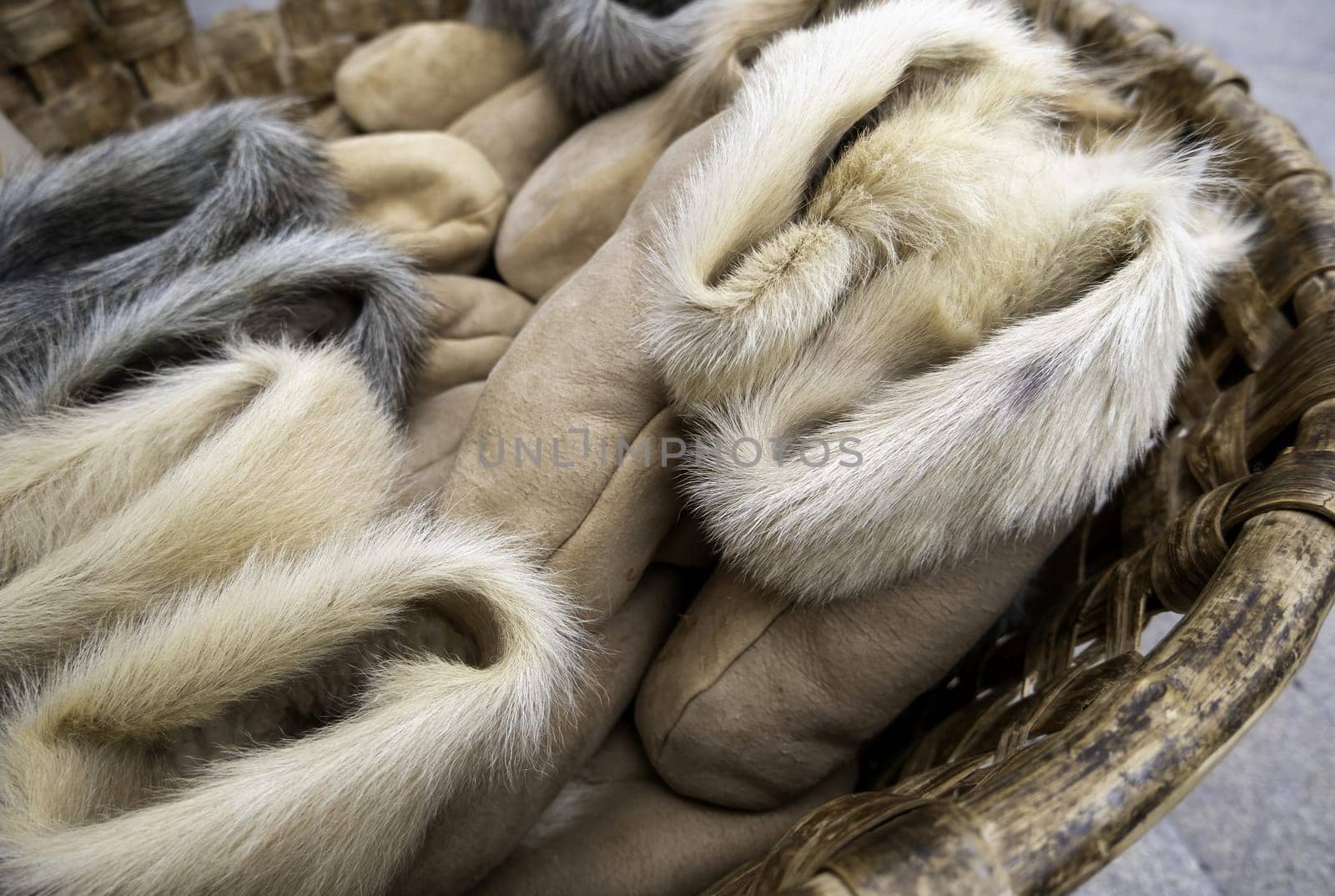 Detail of handmade slippers with animal hair skin for the cold winter