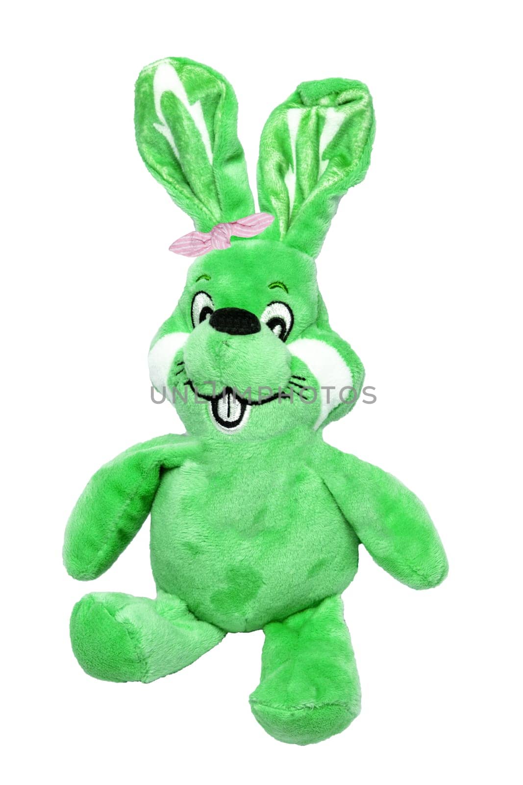 A cute gree plush bunny or rabbit with bow tie isolated on a white background. Easter greeting card decoration element with space for design. Bright plush toy.