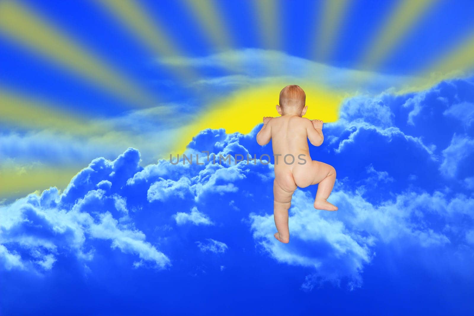 little baby climbs to the clouds on the blue heaven