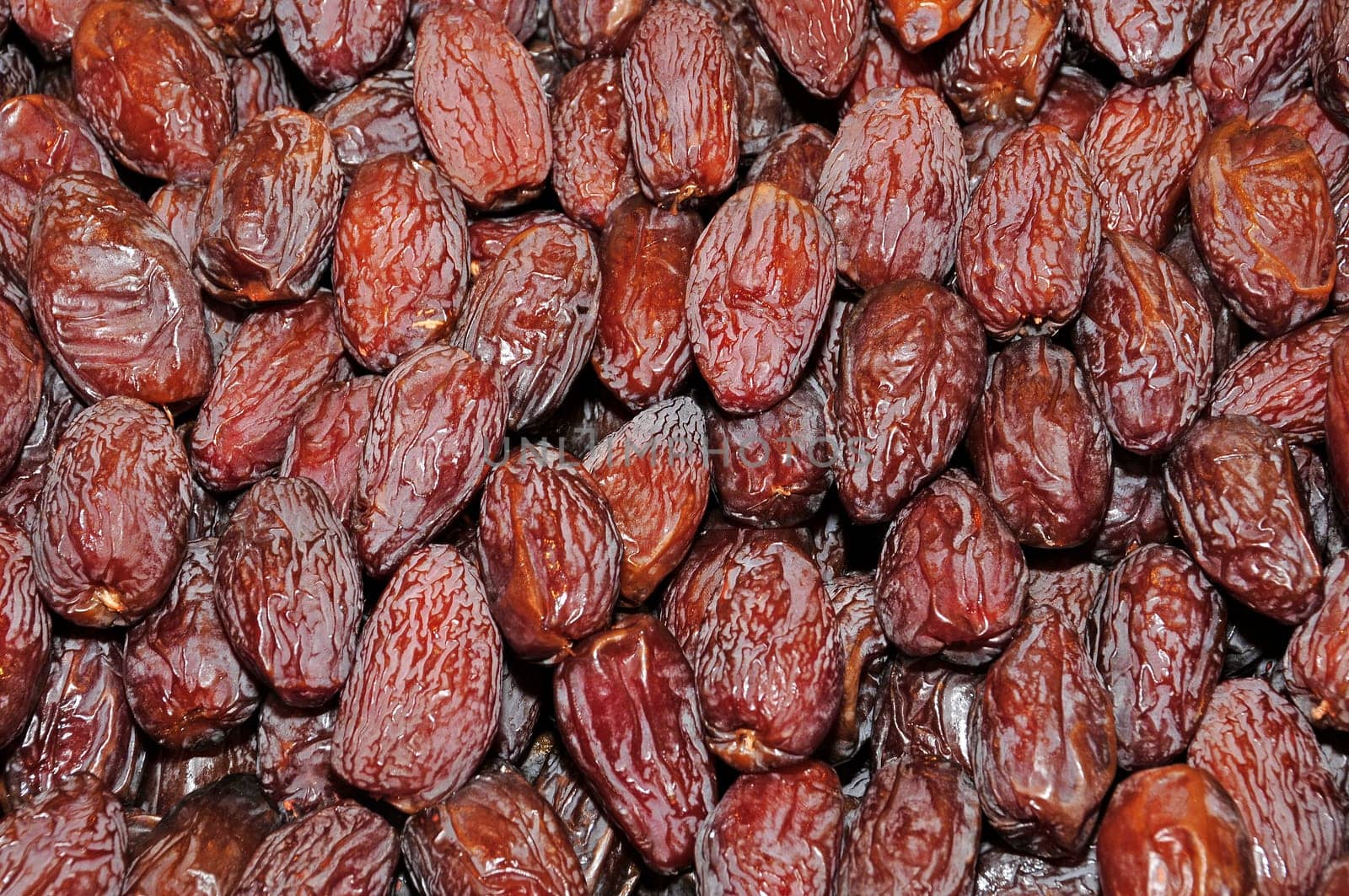 a pile of dried dates ready to sell