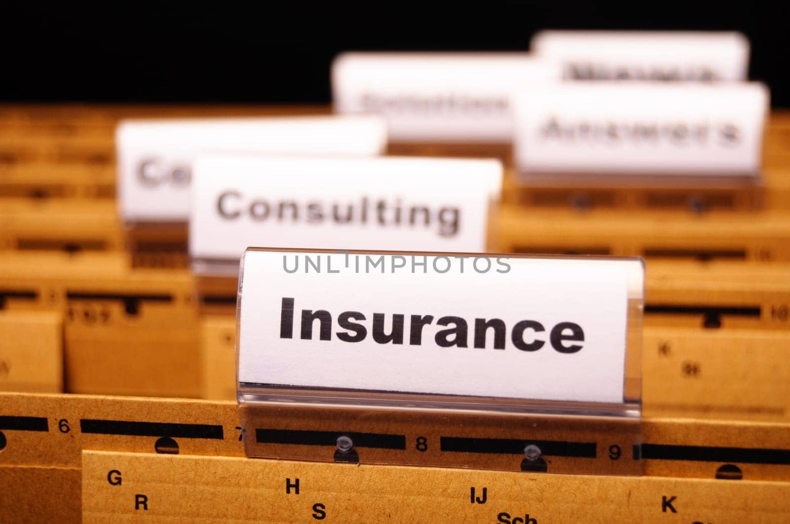 insurance word on business folder showing risk management concept
