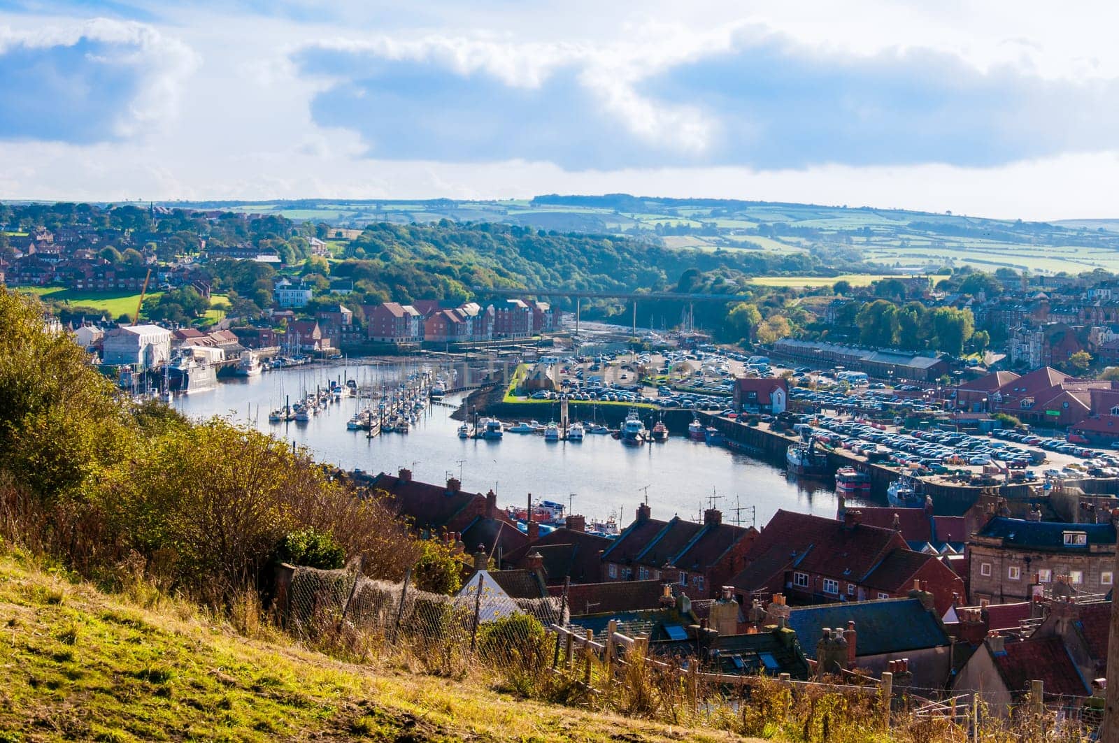 Scenic view of Whitby city in autumn sunny day.Whitby's attraction as a tourist destination is enhanced by its association with the world famous horror novel Dracula, written by Bram Stoker