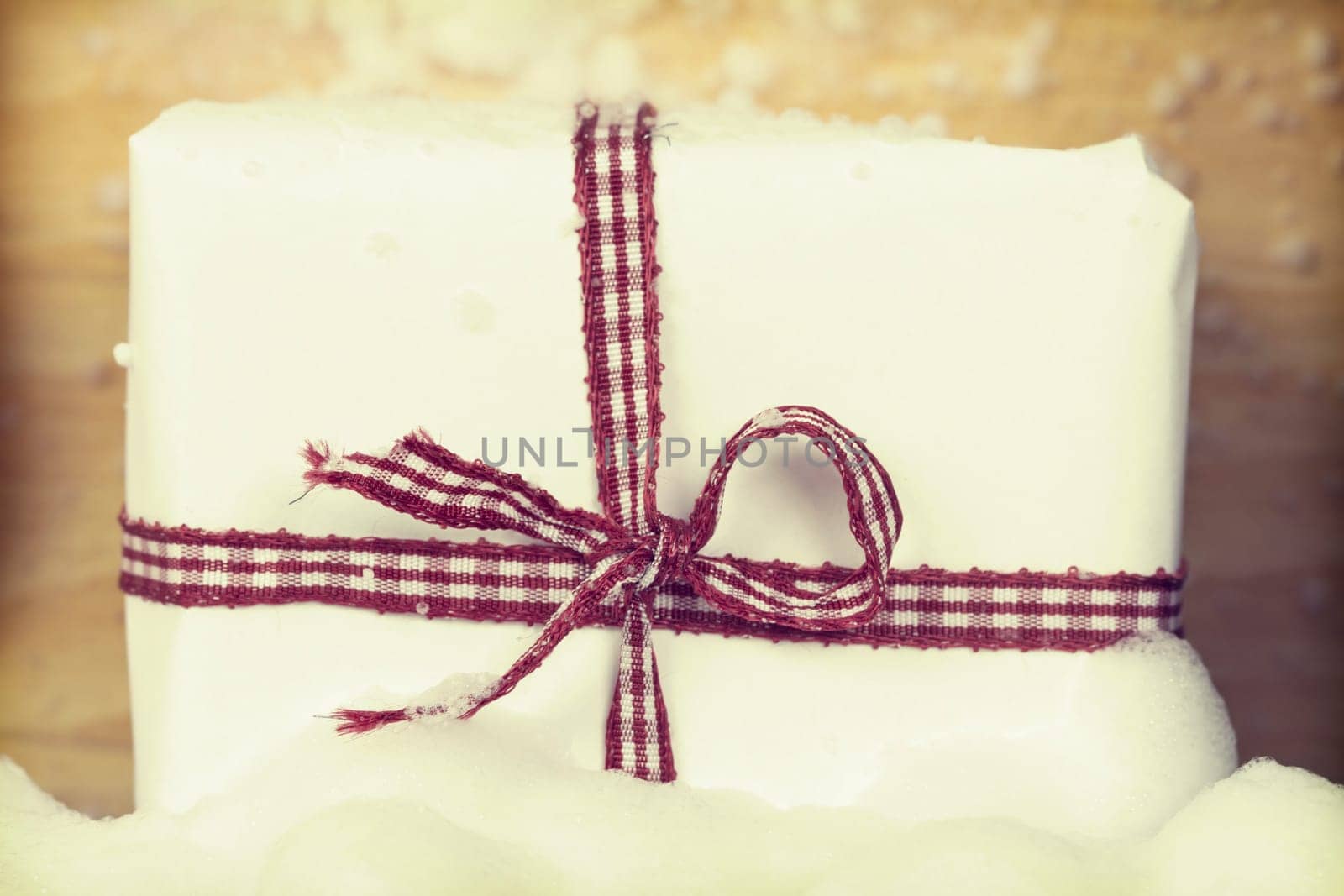 Christmas gift box on wooden background