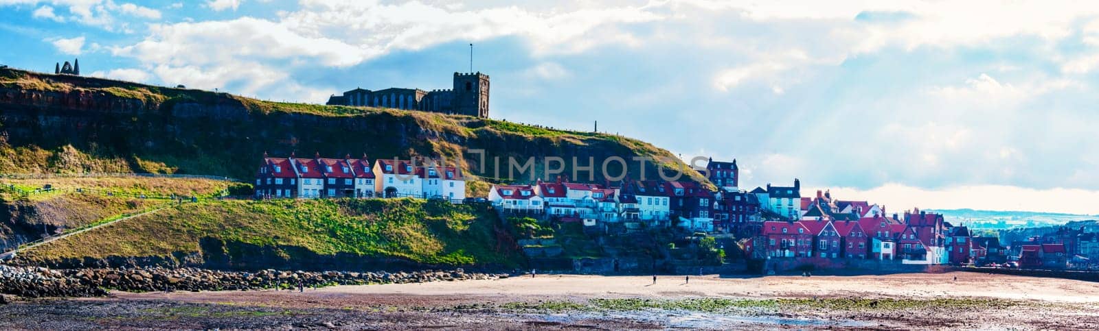 Scenic view of Whitby city in autumn sunny day.Whitby's attraction as a tourist destination is enhanced by its association with the world famous horror novel Dracula, written by Bram Stoker