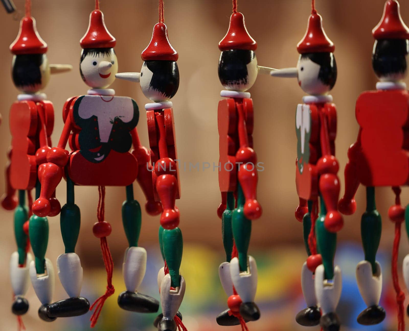 Cracow, Poland - December 19, 2021:Traditional wooden Pinocchio toy sold in souvenir shop in Cracow.