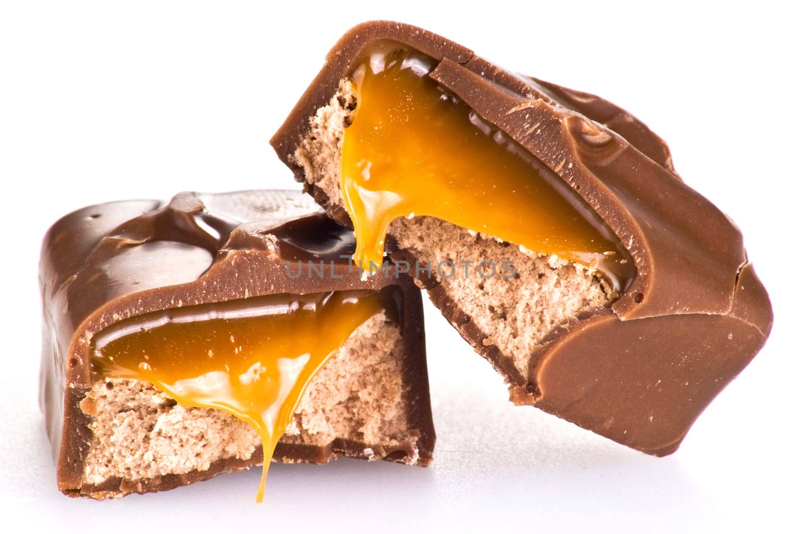 Chocolate bar with caramel isolated on white