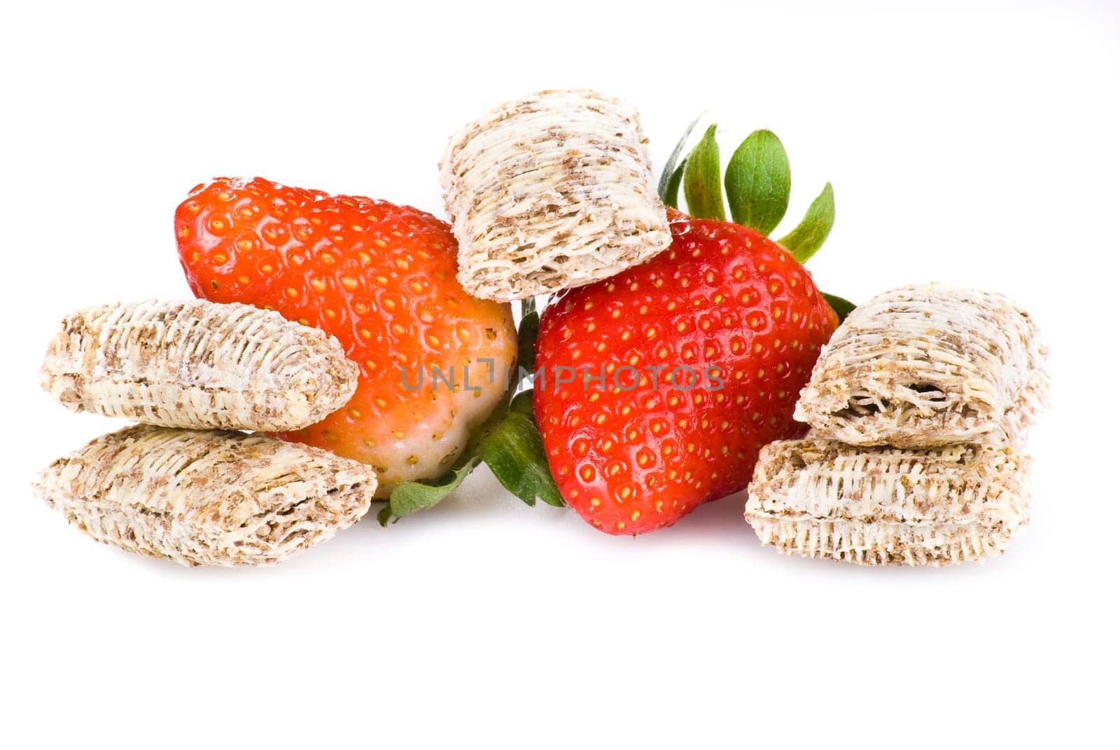 Wheat cereal with strawberries over white background - isolated