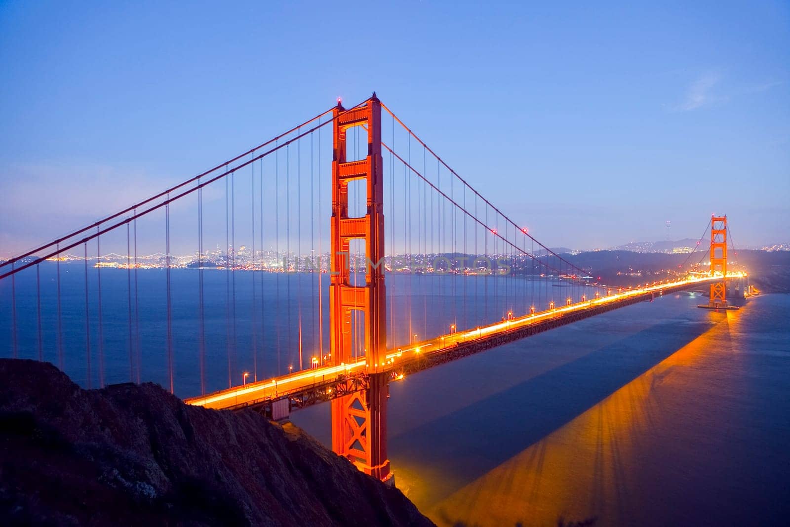 Golden Gate Bridge at Night with San Francisco Skyline, long exposure