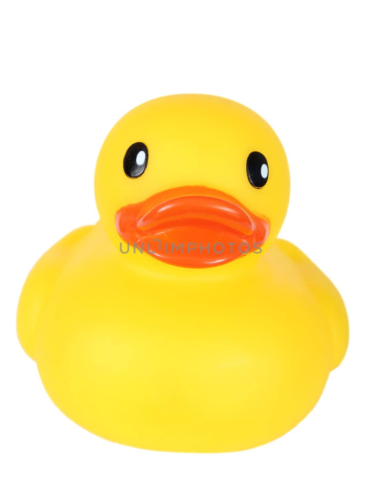 Yellow toy duck with orange beak on white