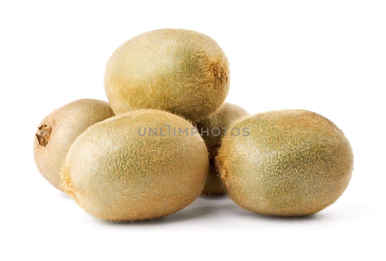 Hill of five whole kiwi isolated on white background