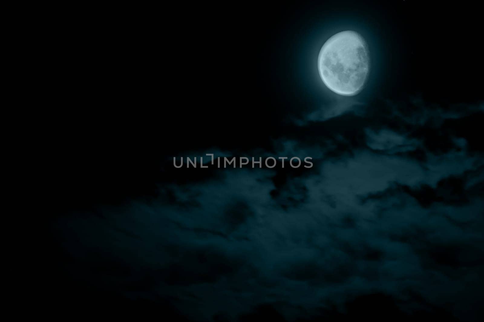Mysterious Waning Gibbous Moon and Dark Clouds
