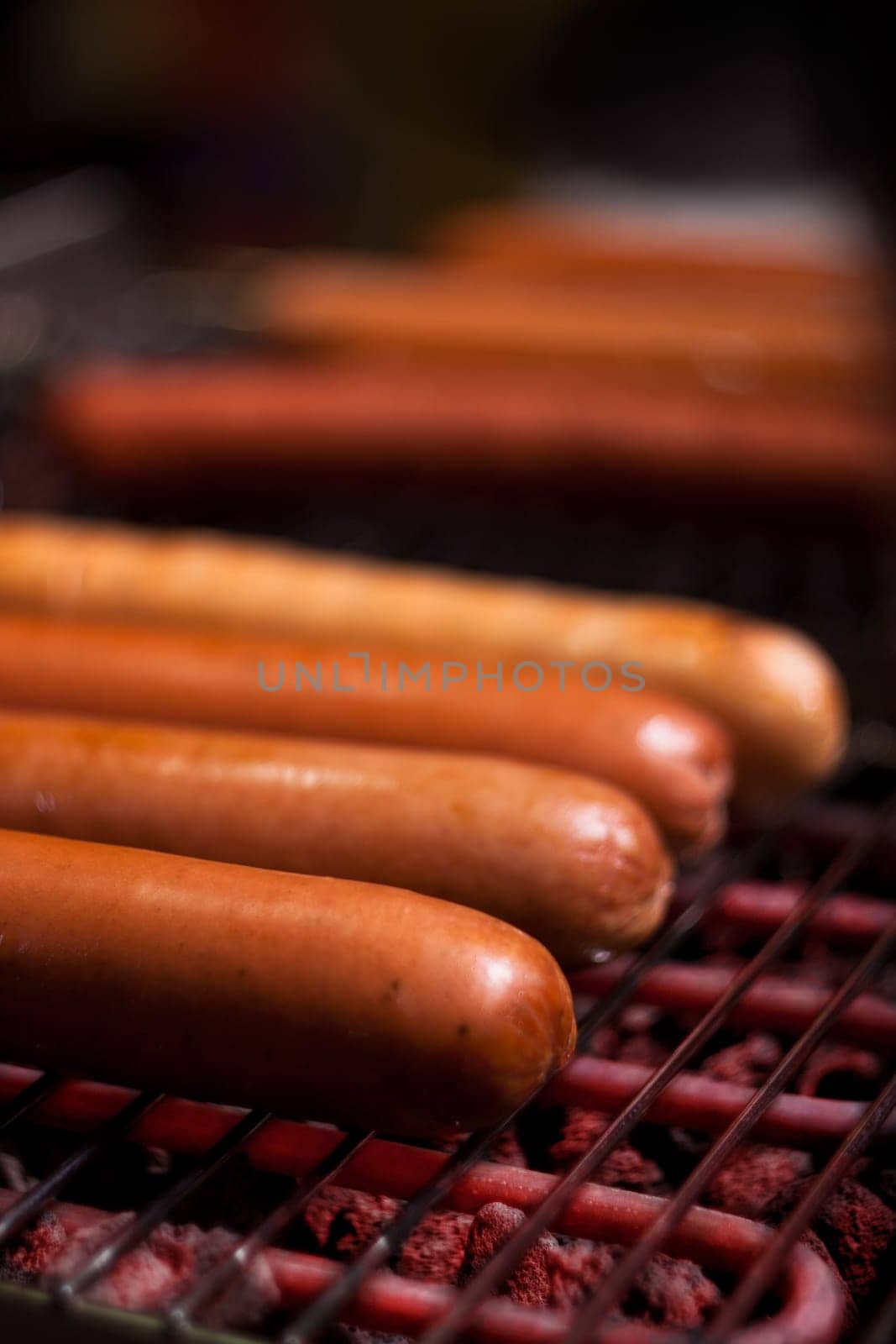 Sausage grill. Shooting a meal on the grill. four of them.