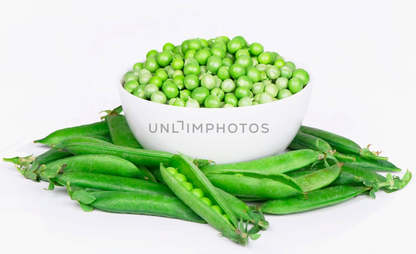 Bowl with green peas the isolated on white background