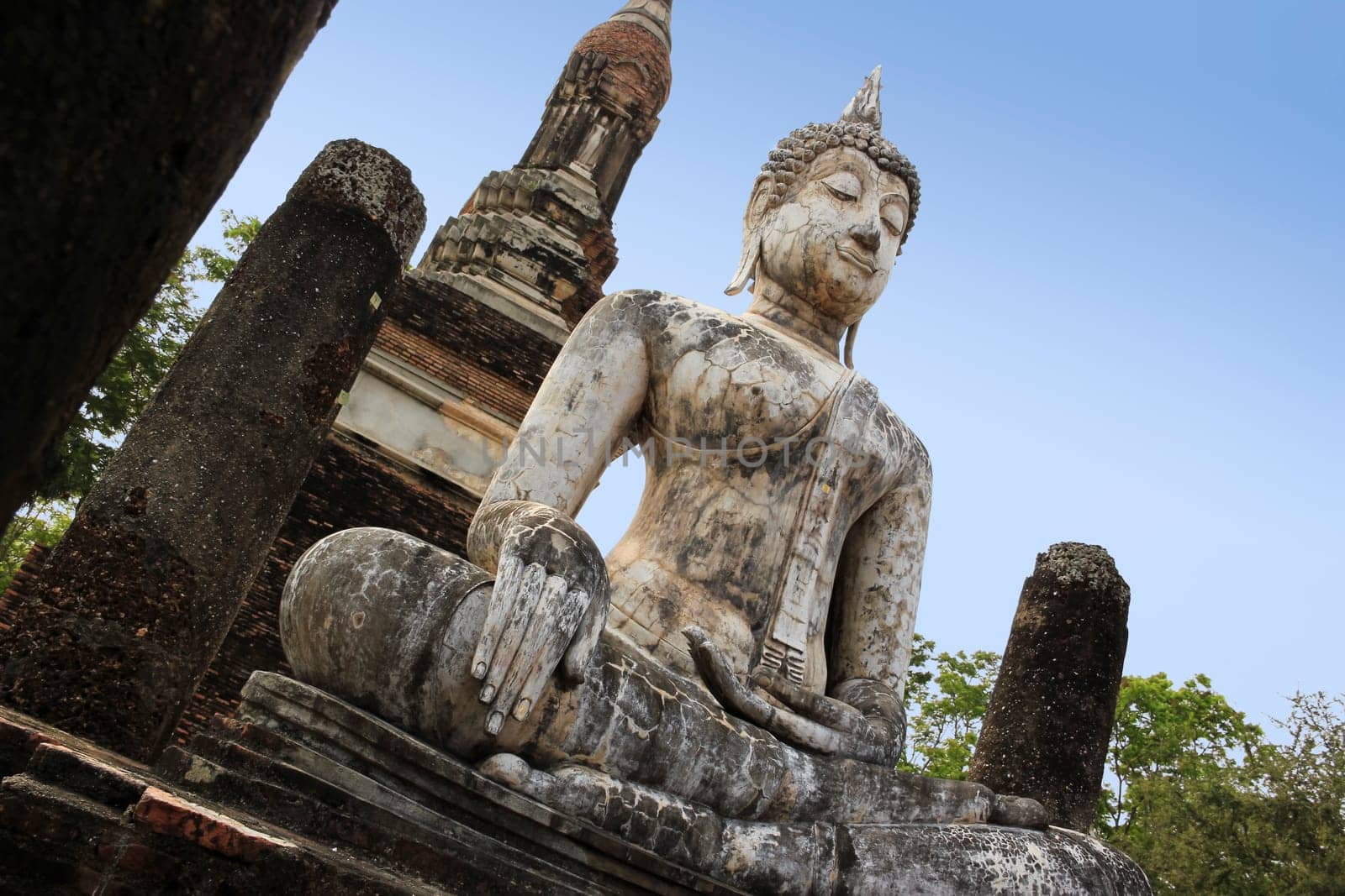 old buddha statue in the temple ruins of sukhothai historical park the ancient capital of thailand