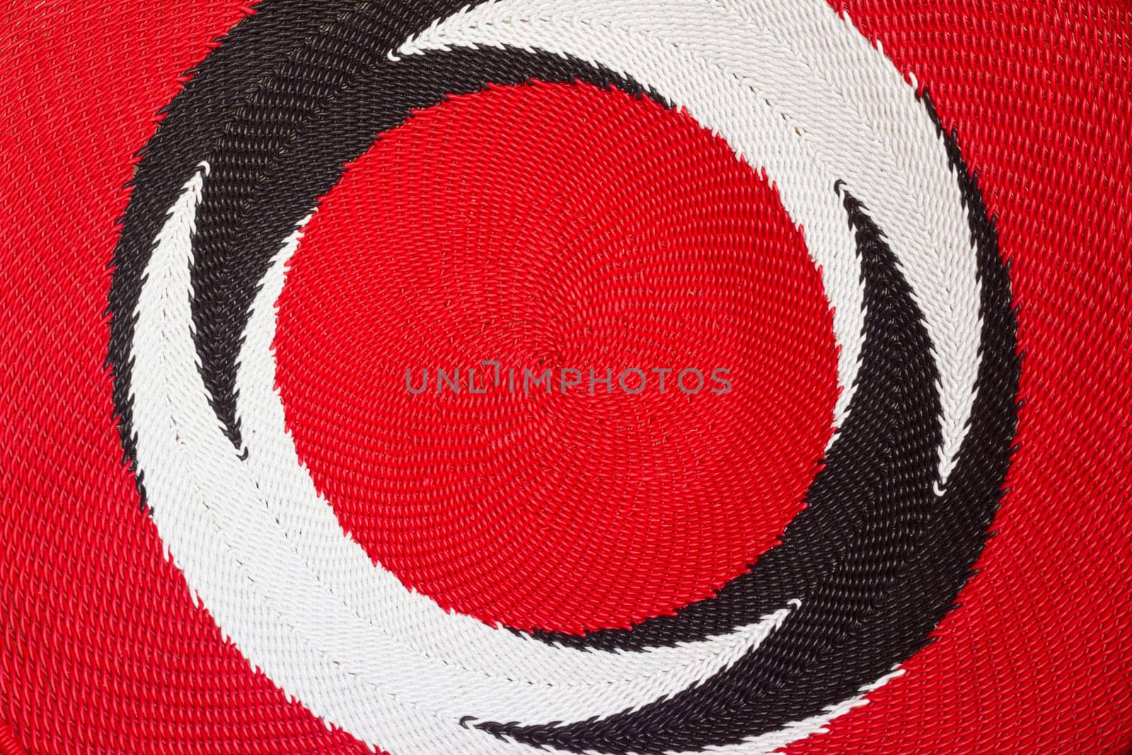 Close up photo  of hand-made plaited plate as a background
