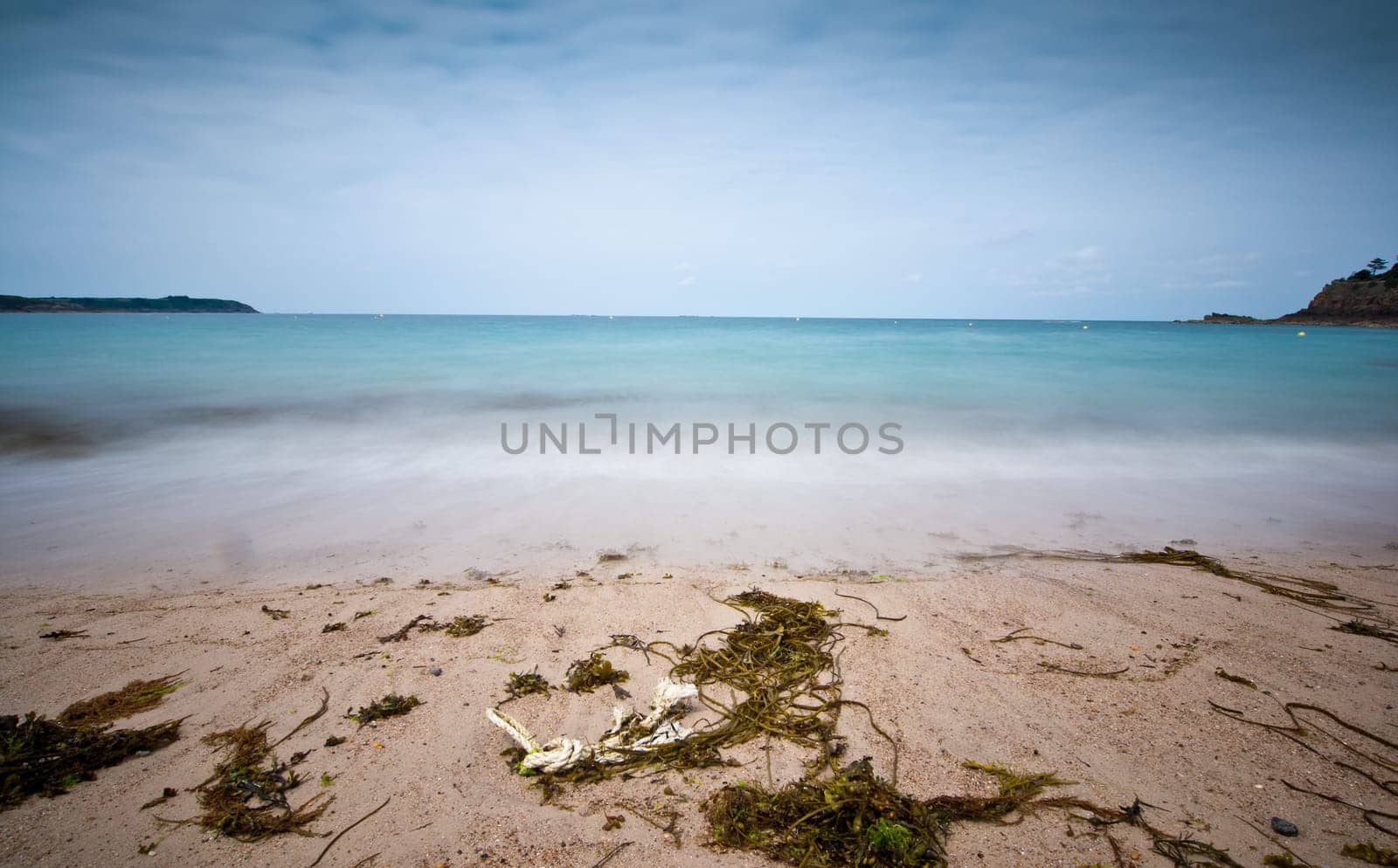 Long exposure photo of beach and sea
