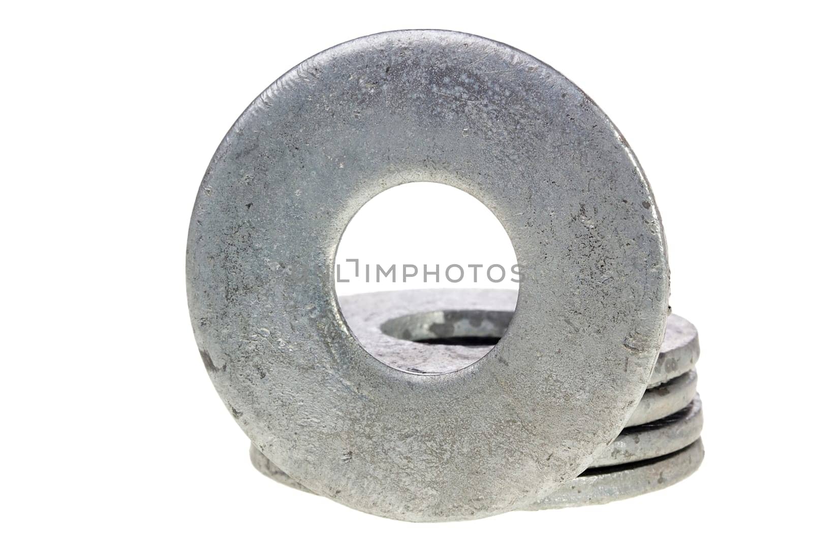 Flat metal washers isolated on a white background.