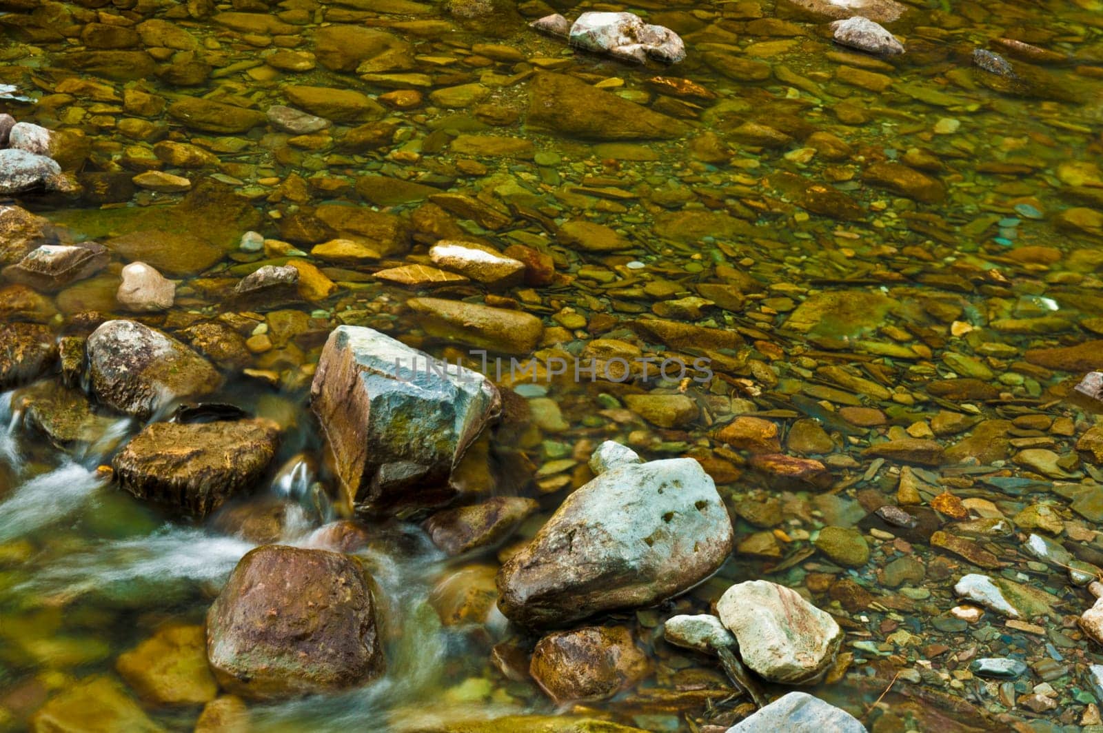 Stream over pebbels and rocks