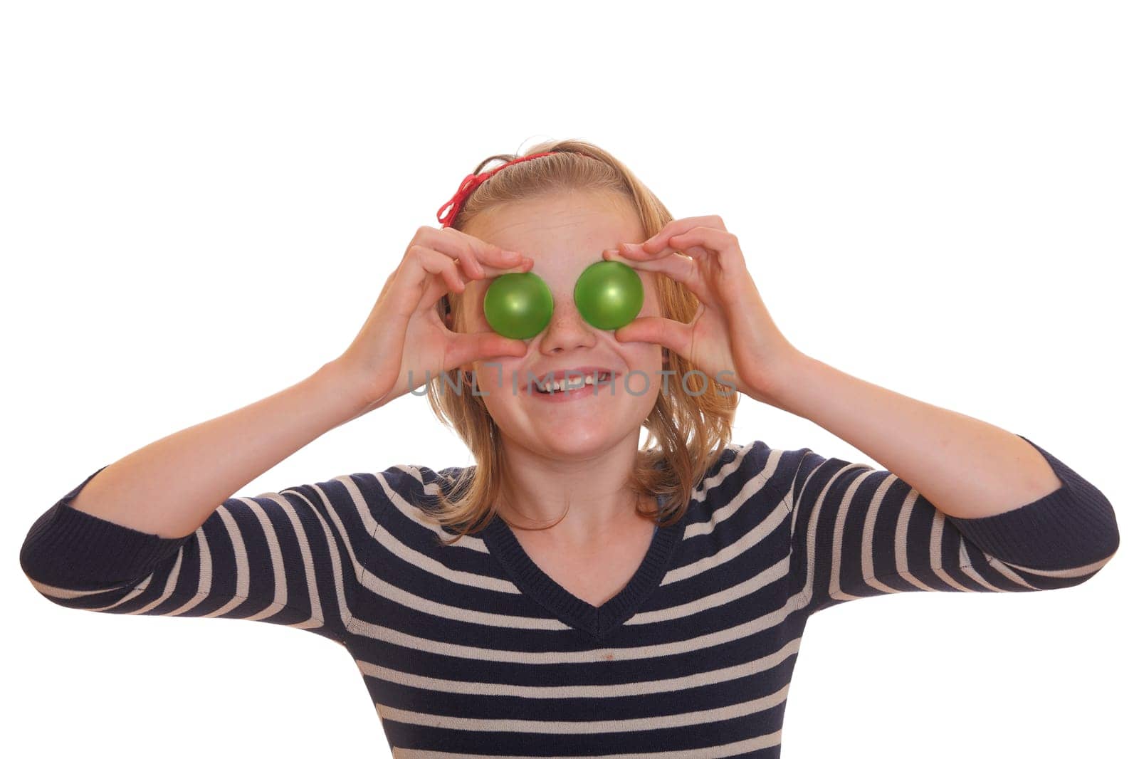 Portrait of a young girl covering her eyes with blinking objects