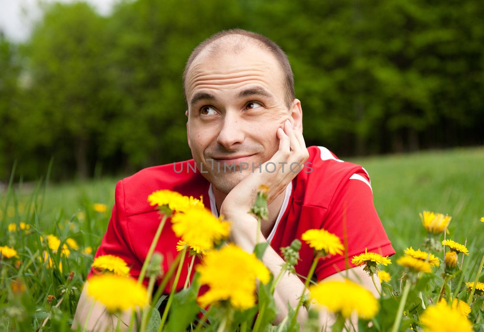 young man  on the grass