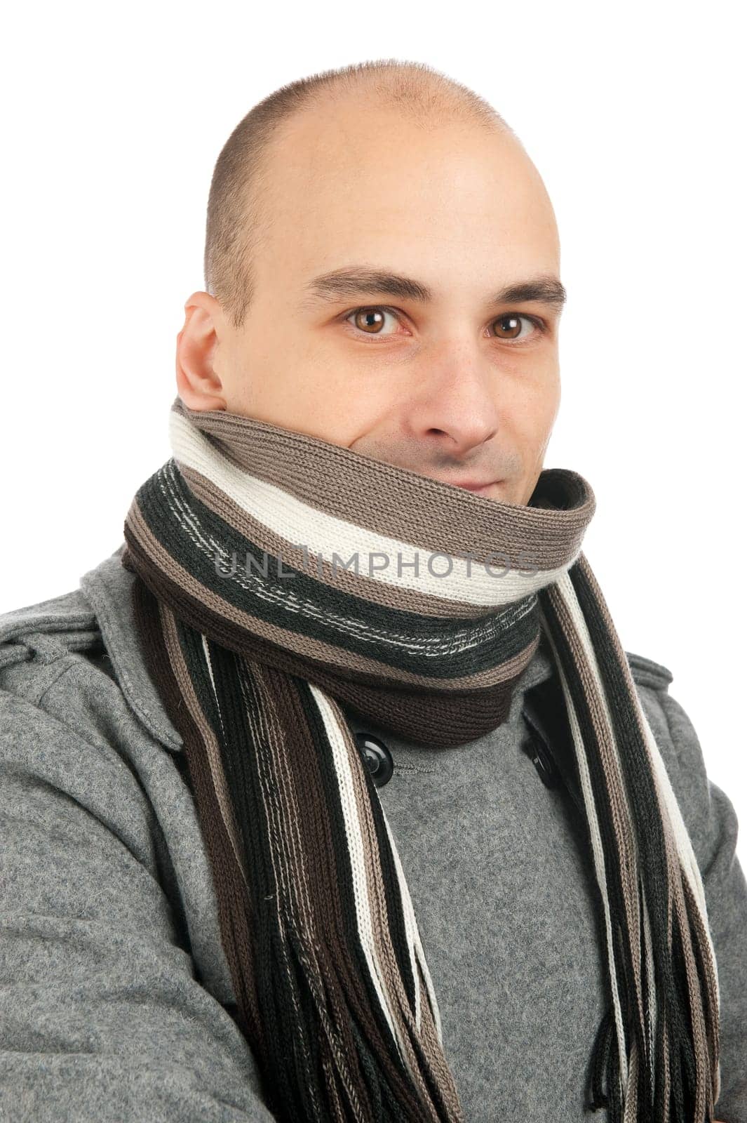 Attractive male wearing a coat and scarf