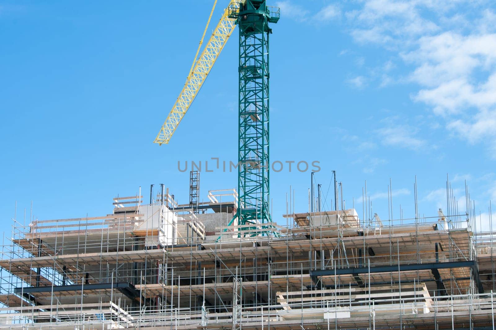 large crane above a not yet finished building