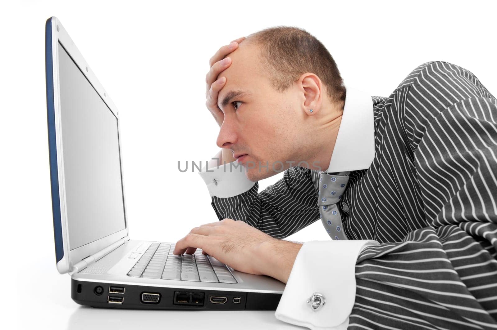 Young businessman working with laptop
