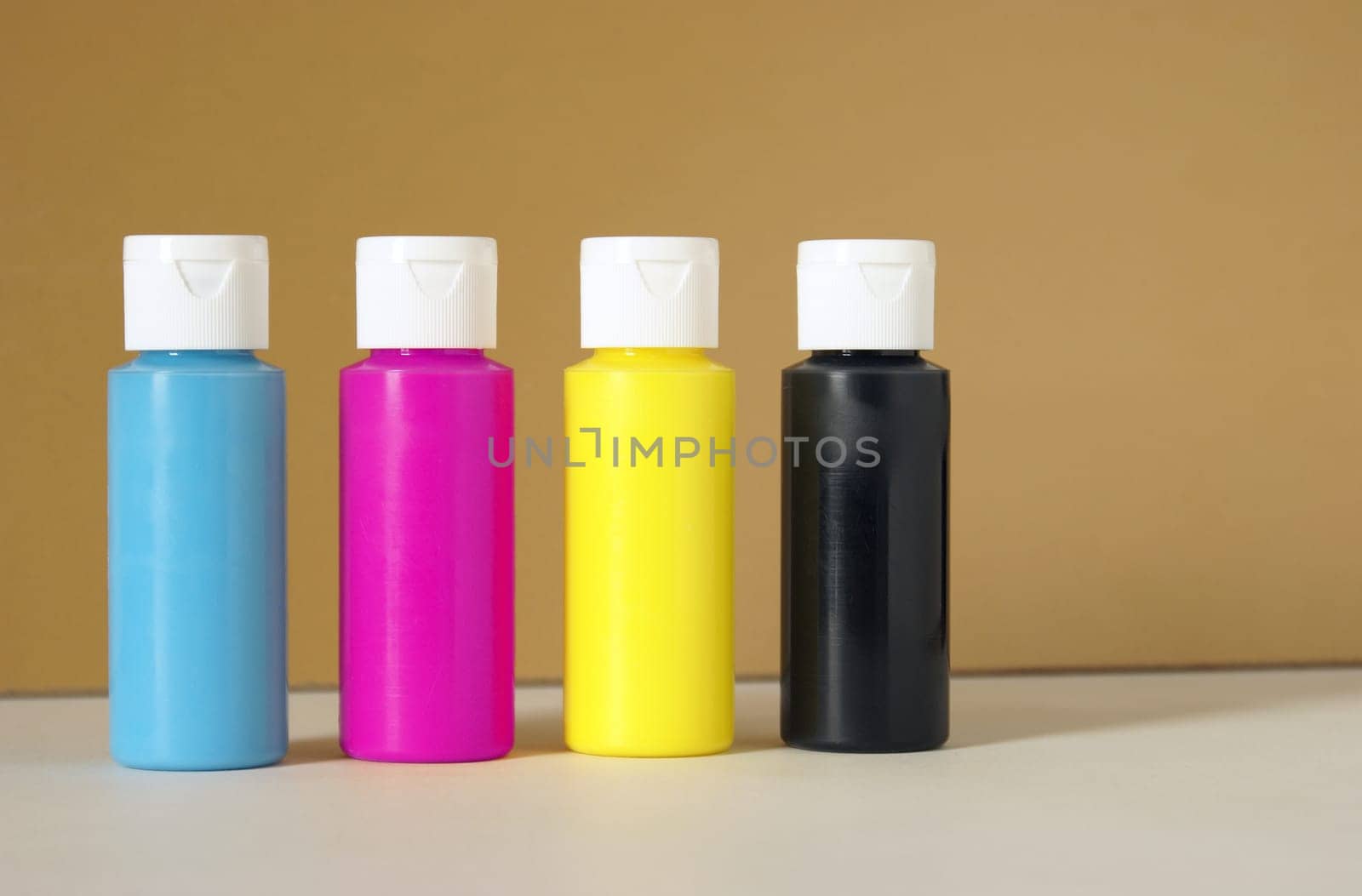 CMYK containers of paint for accurate color reproductions.