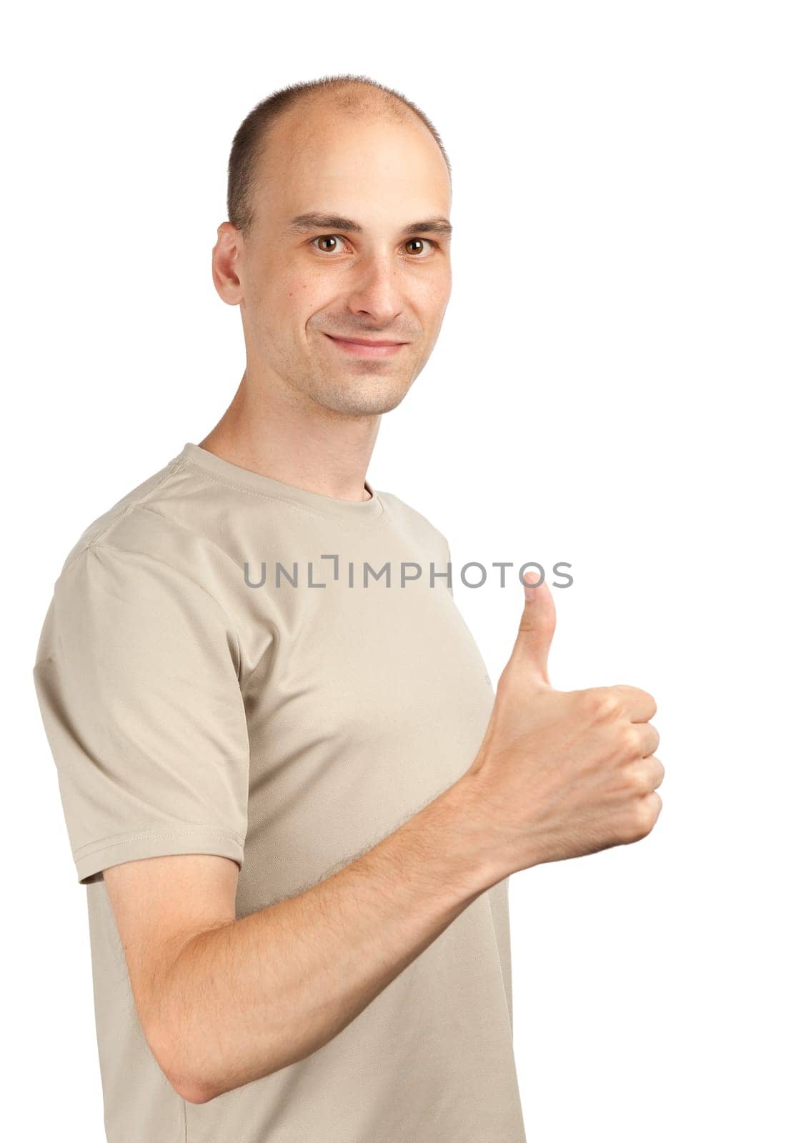 Young man with a thumb up sign. Isolated over white.