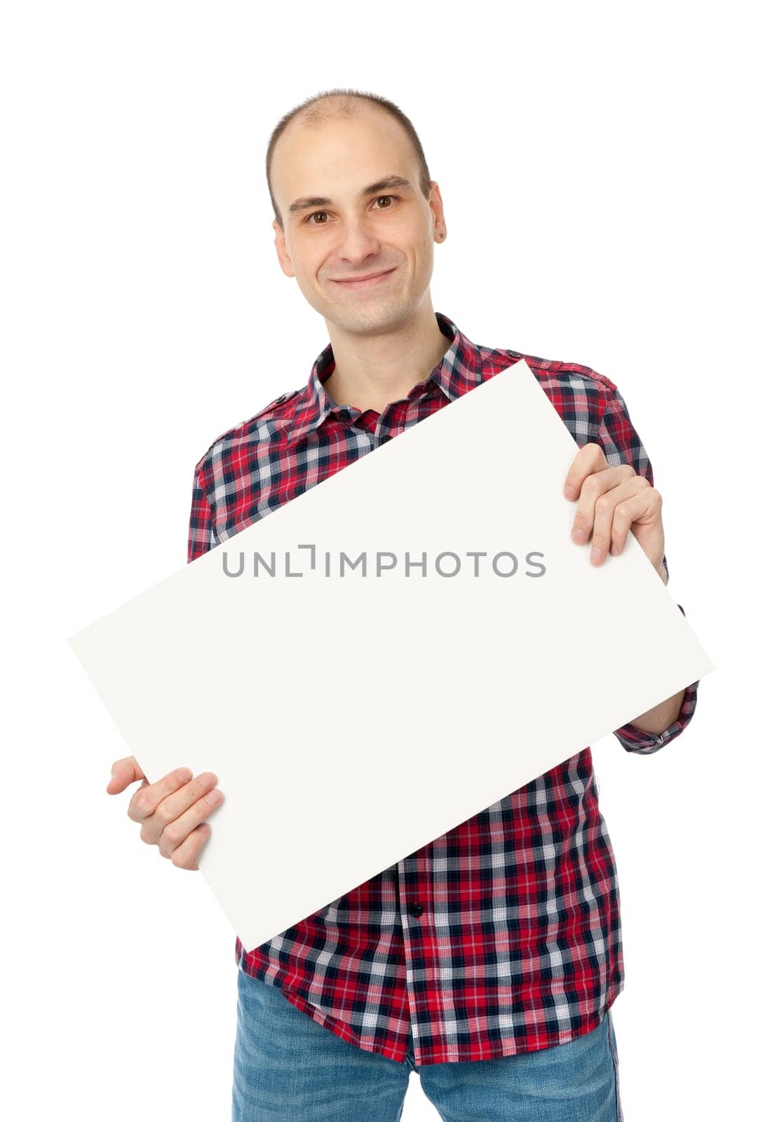 happy handsome young man holding blank white card over white background