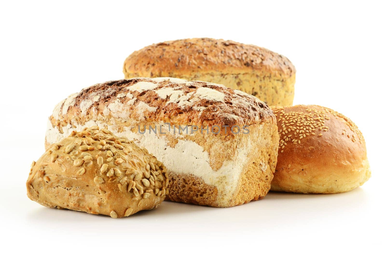 Composition with bread and rolls on kitchen table