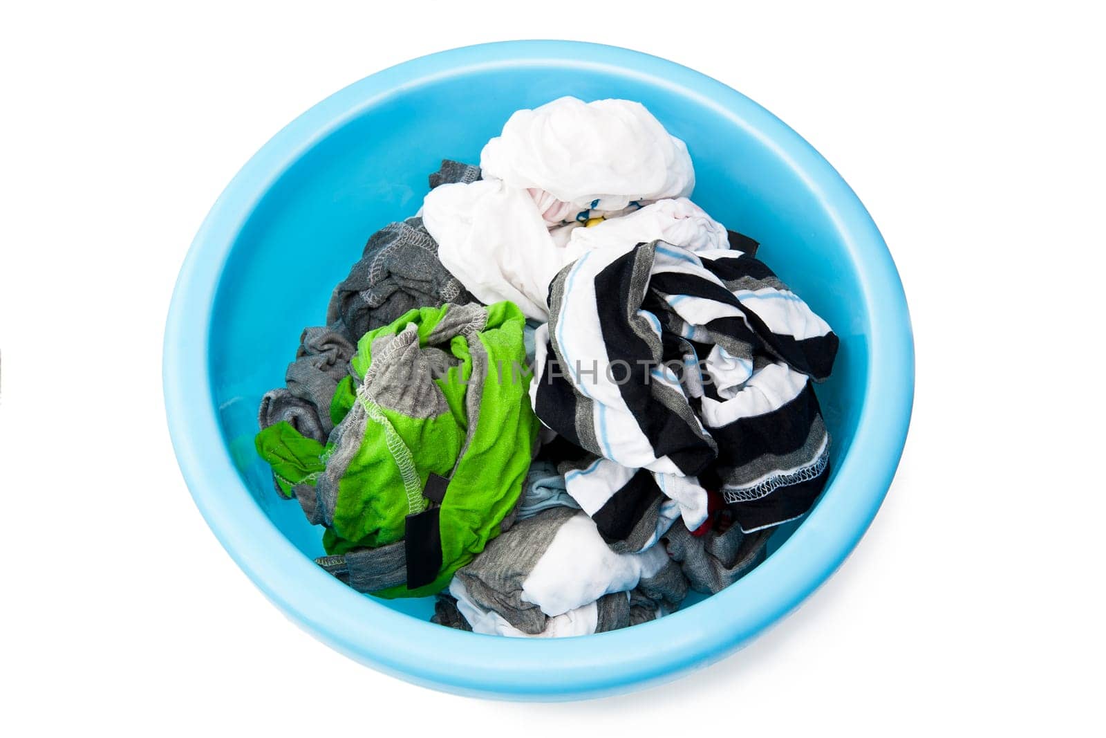 Washed clothes on the white background