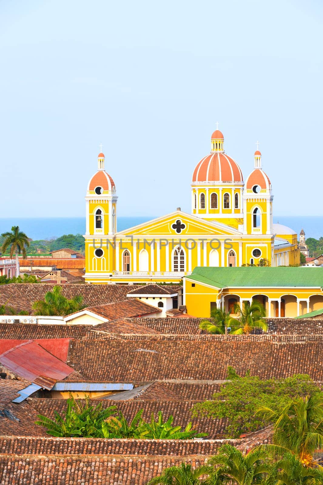 Granada cathedral and lake Nicaragua on the background, Nicaragua.