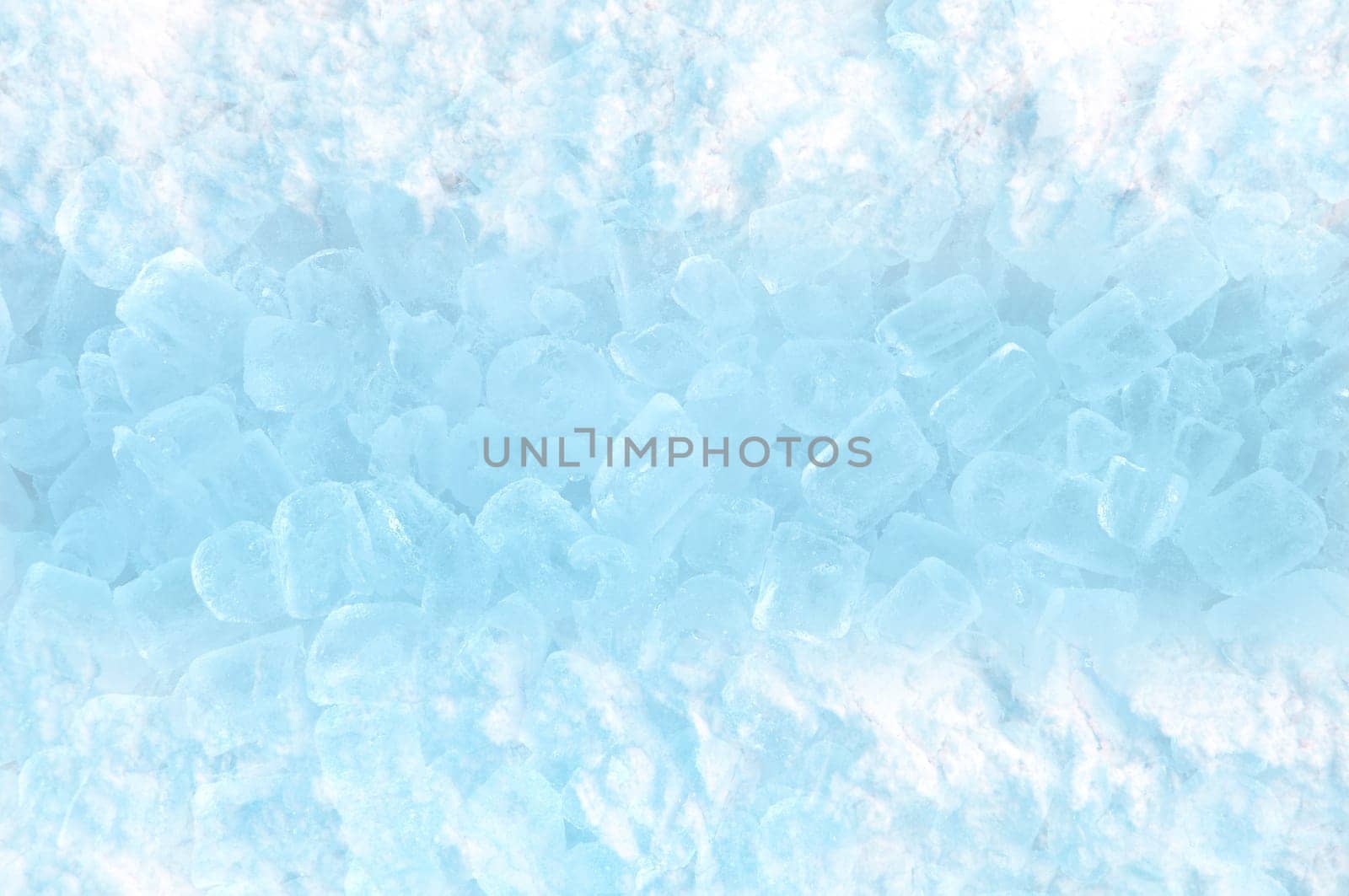 abstract ice cube and snow in blue light background