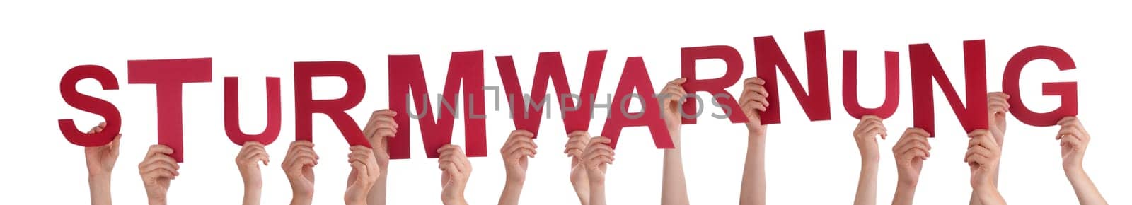 People Or Persons Hands Building German Word Sturmwarnung Means Storm Warning. Isolated White Background.