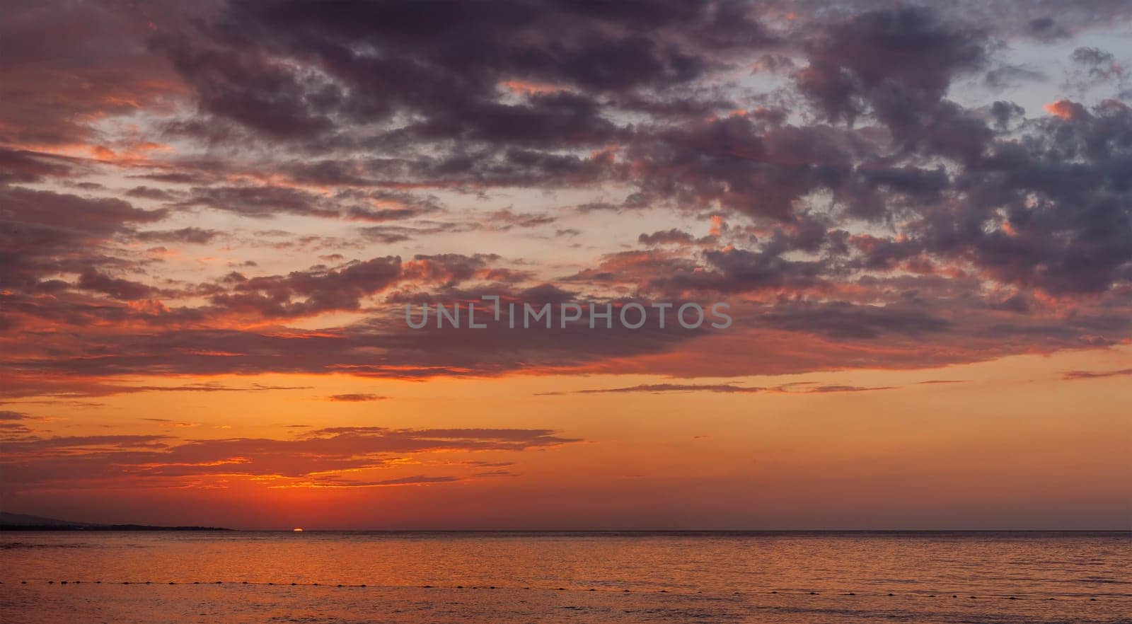 The beautiful red sunset at the beach.