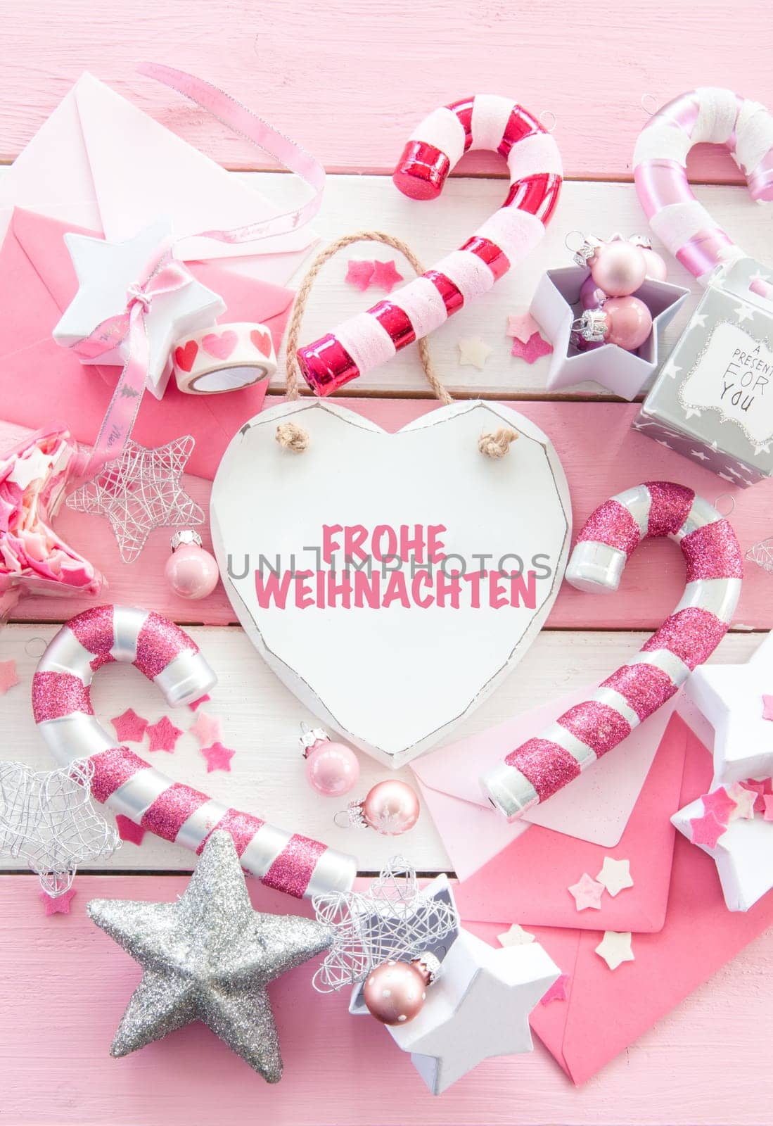 Pink Christmas decoration with love sign in heart shape