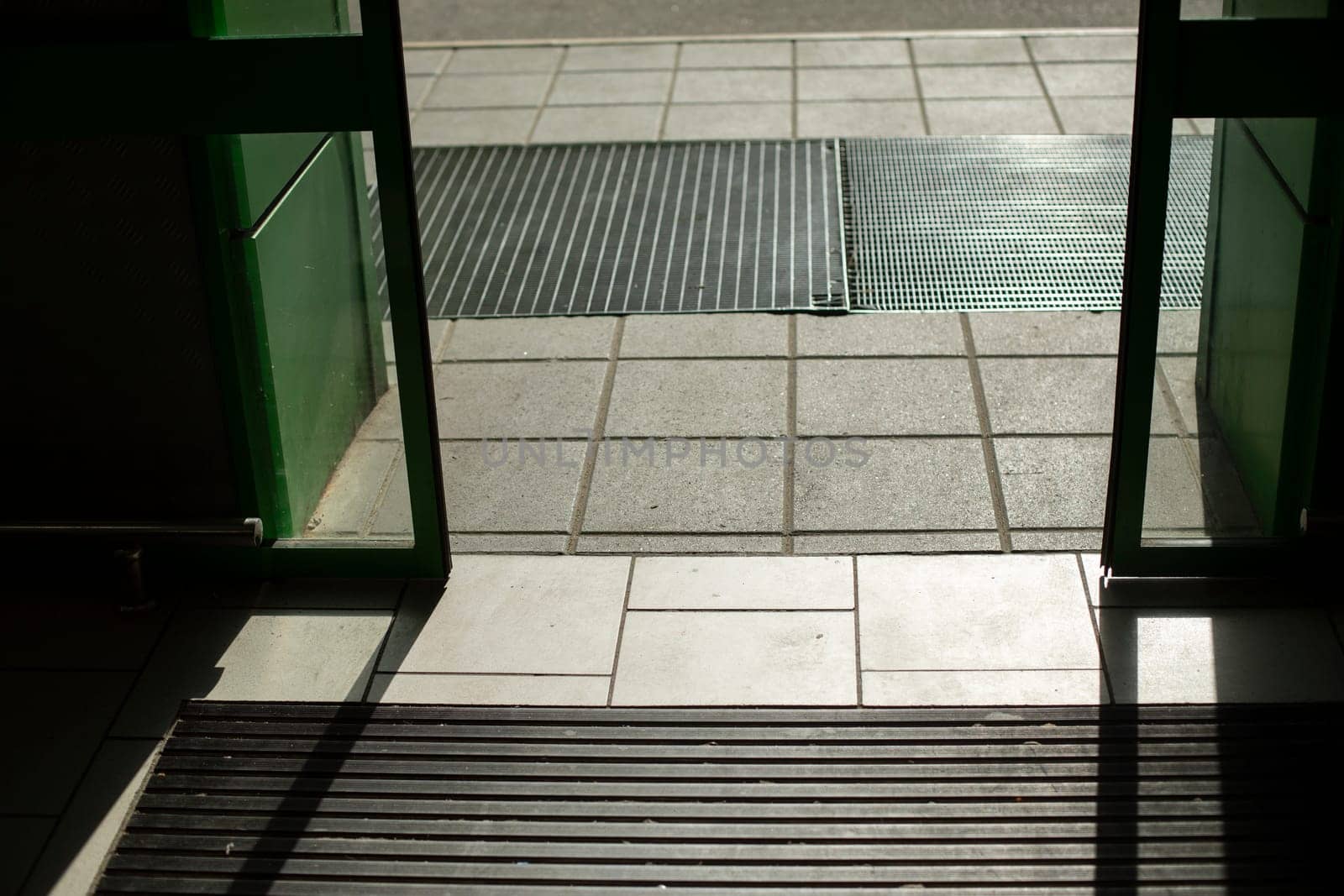 Doors open automatically. Opening door by motion sensor. Entrance to building. Login details.