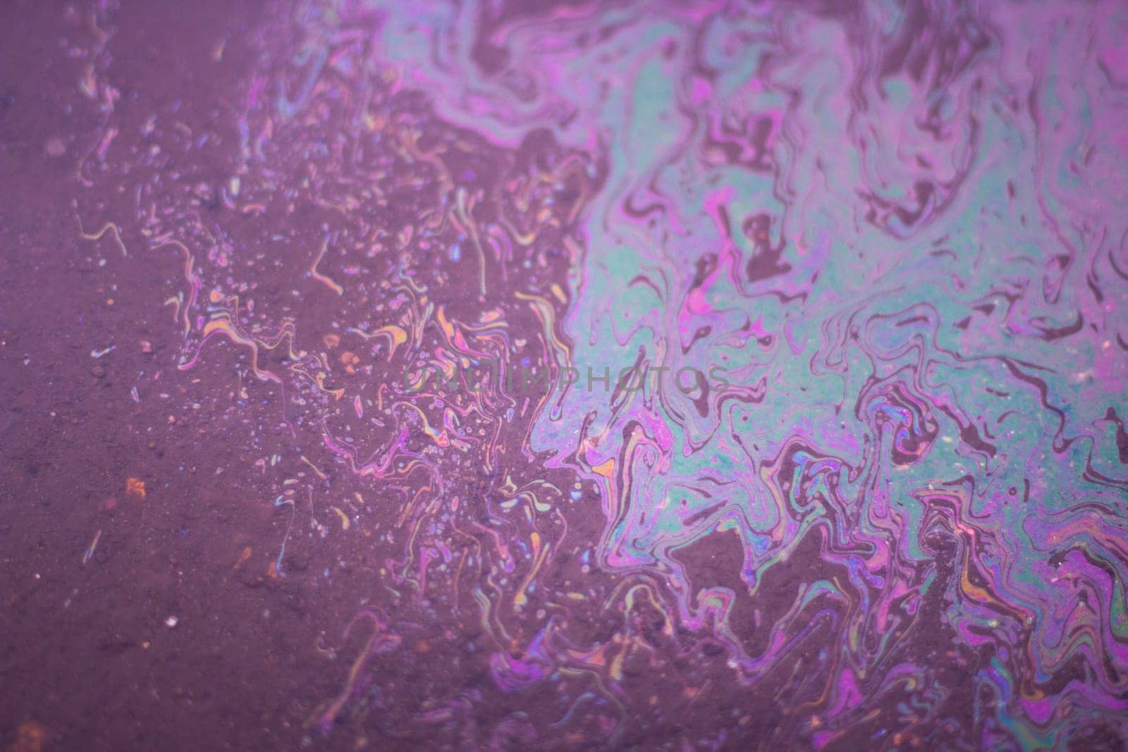 Petrol stain. Oil footprint. Bright colors. Poisoned water. Acidic texture.
