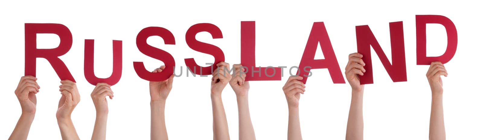 People Or Persons Hands Building German Word Russland Means Russia. Isolated White Background.