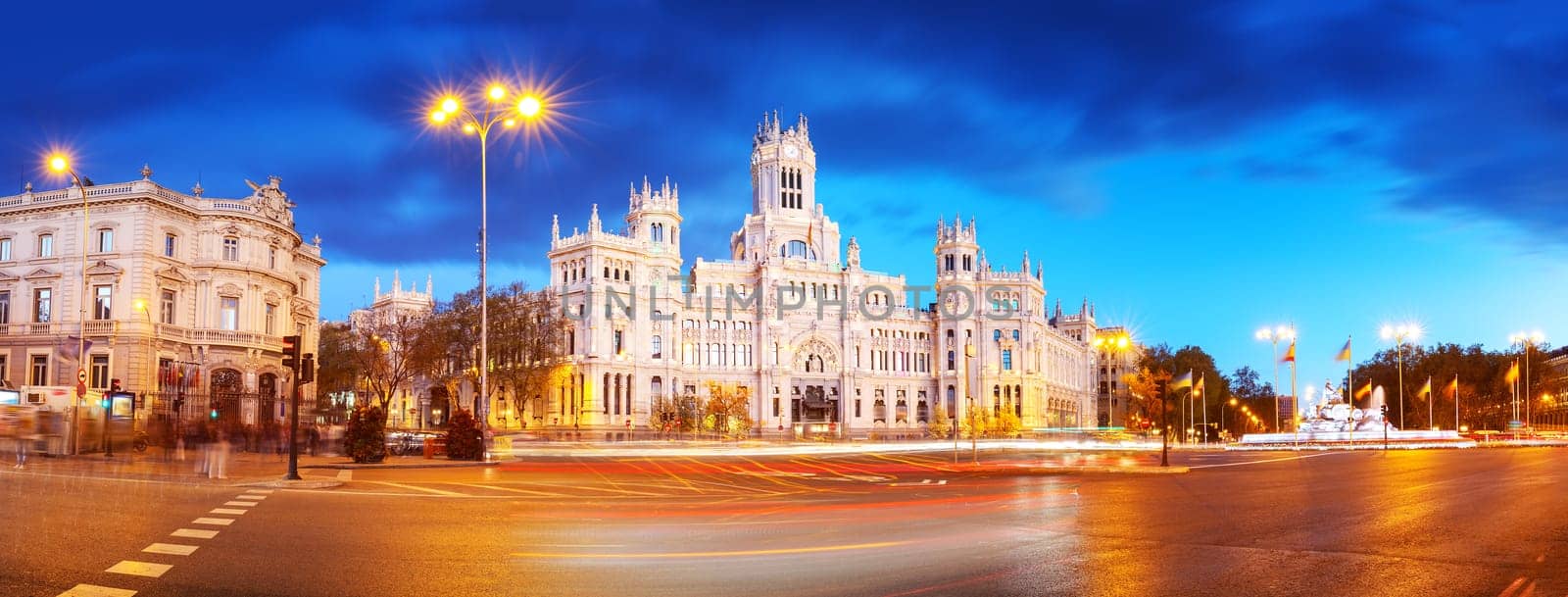 Night view on the square with Cybele Palace in Marid, Spain. Famous historical place.