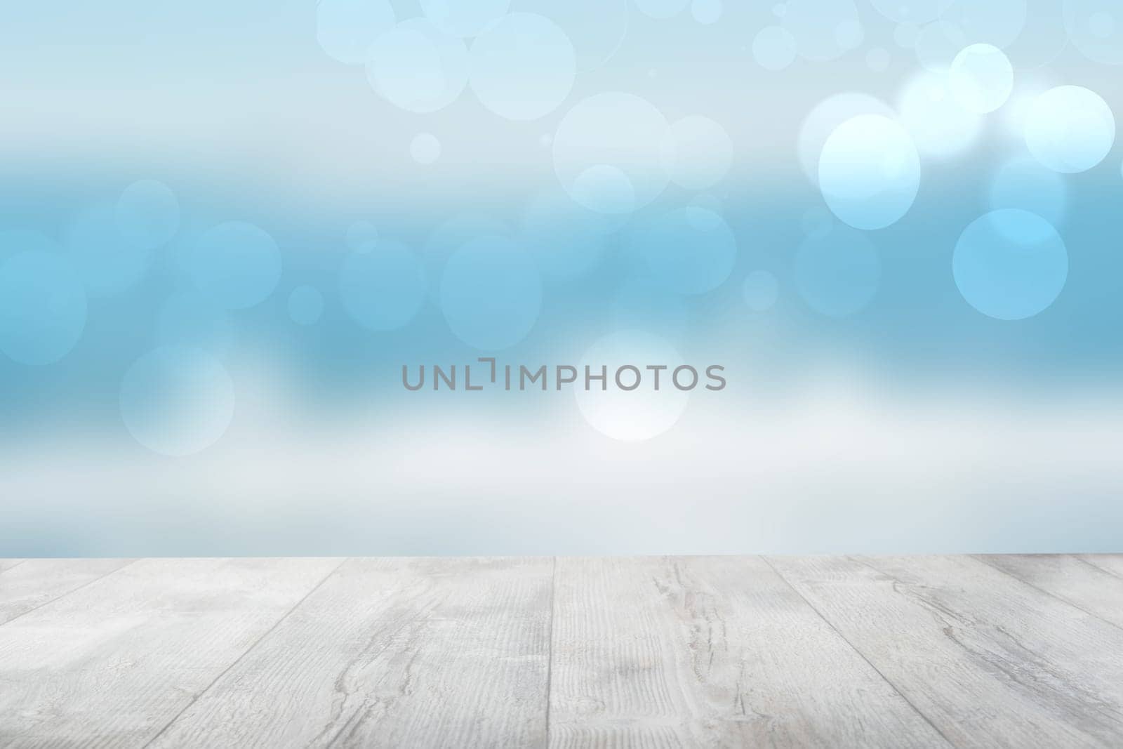 Empty wooden table over abstract blurred natural cloudy blue sky background. Space for your food and product display montage.