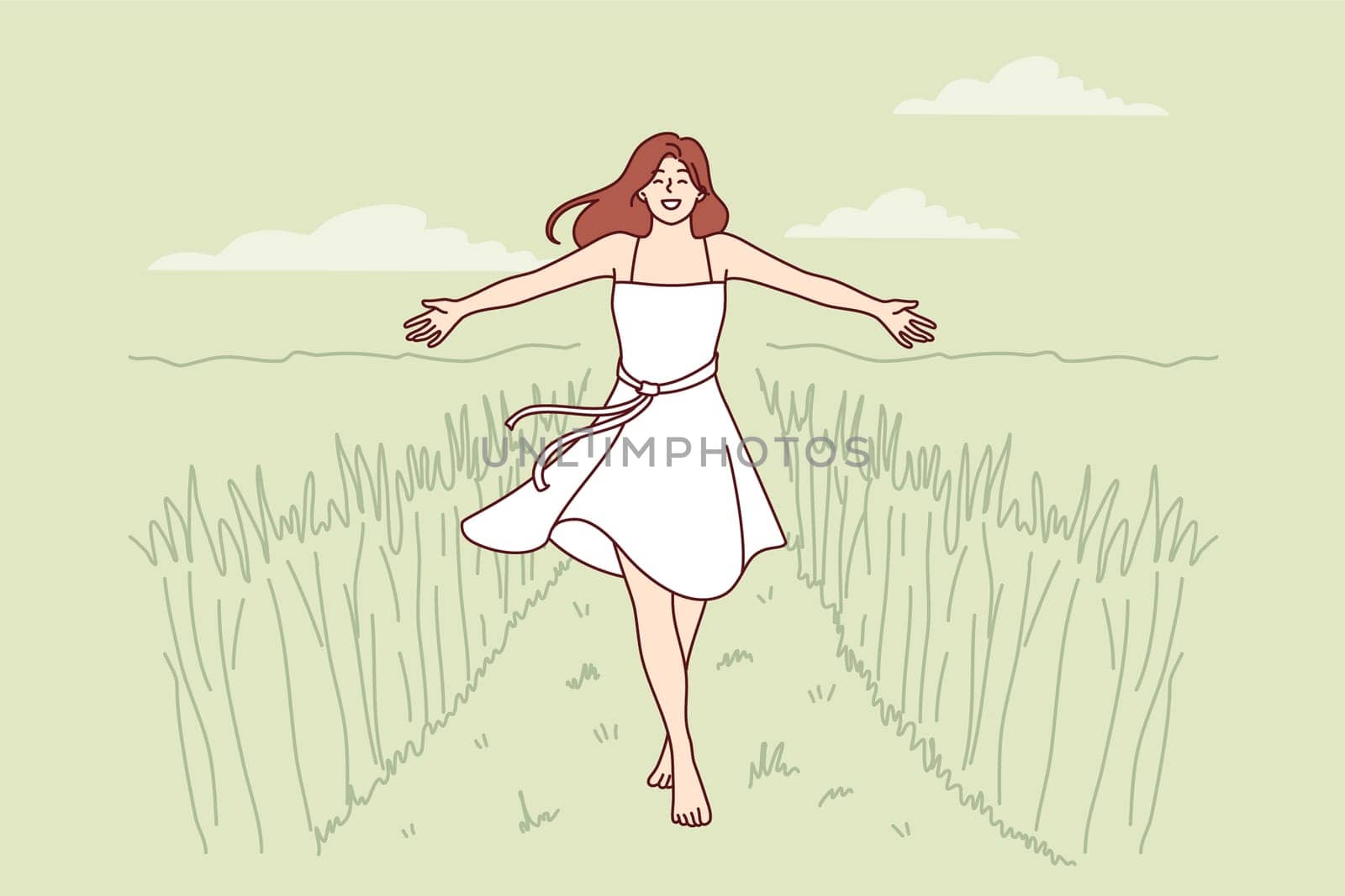 Woman walks along path among tall grass enjoying beautiful nature in rural or farming area. Girl in dress enjoys walk in wild nature or agricultural field in ecologically clean place.
