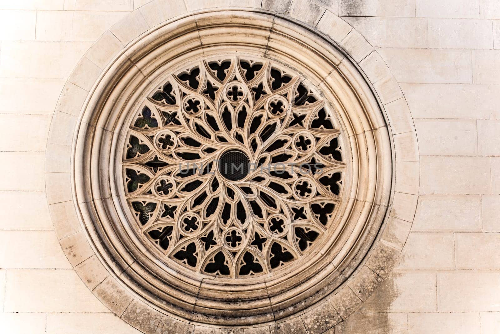 Coimbra, Portugal - Sept 7th 2019: Rose window of Rose window of Santo Agostinho da Graca, Santarem, Portugal dos Pequenitos, Coimbra