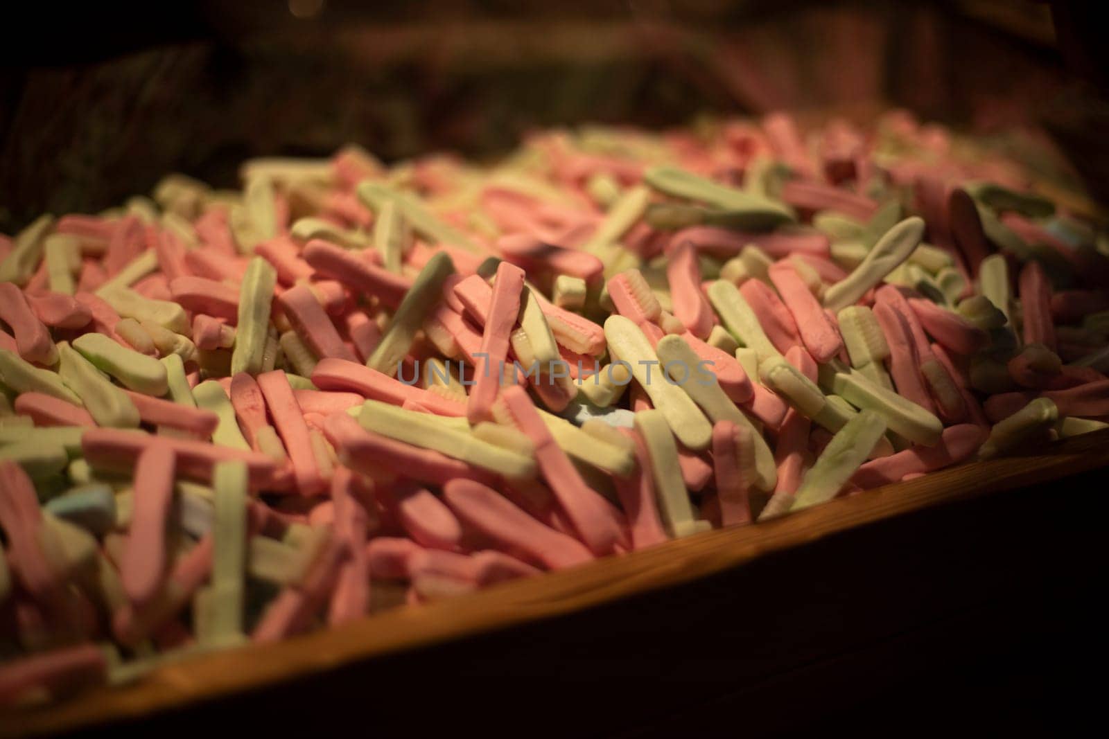Sweets on wind. Chewing gum in box. Lots of candy in drawer. Details of sale of sweet goods.