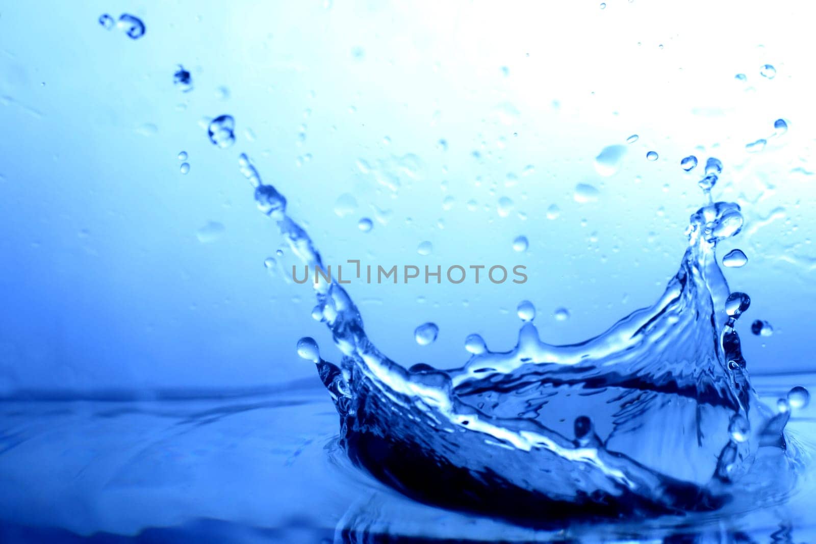 great blue water splash close up macro