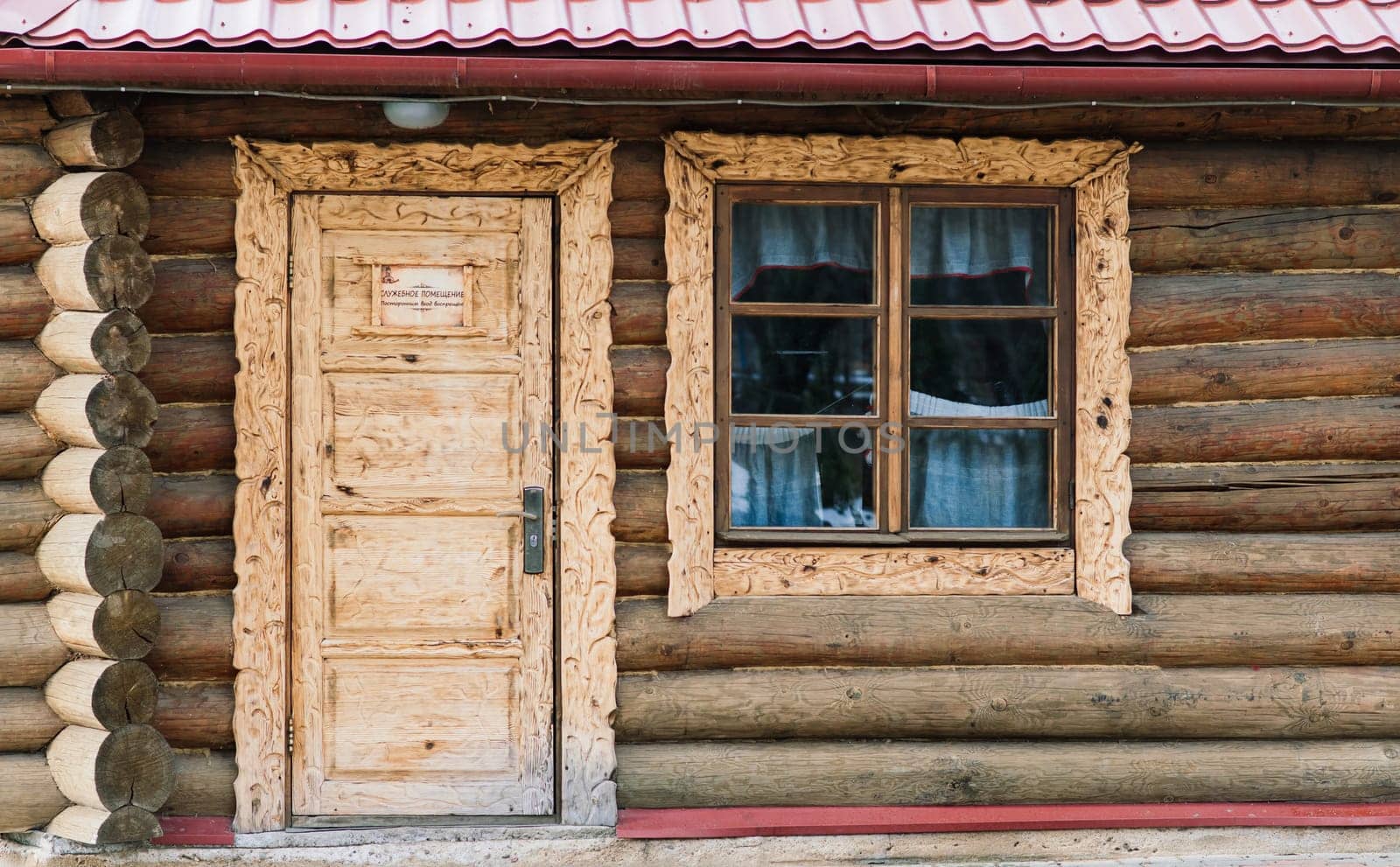 Beautiful new wooden house in a garden with decoration