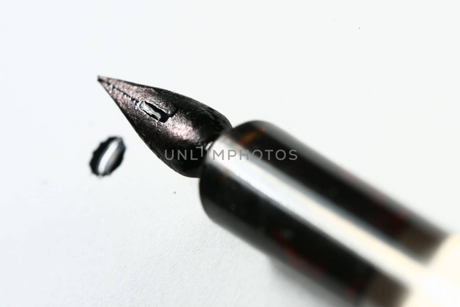 ink and pen on white paper writer