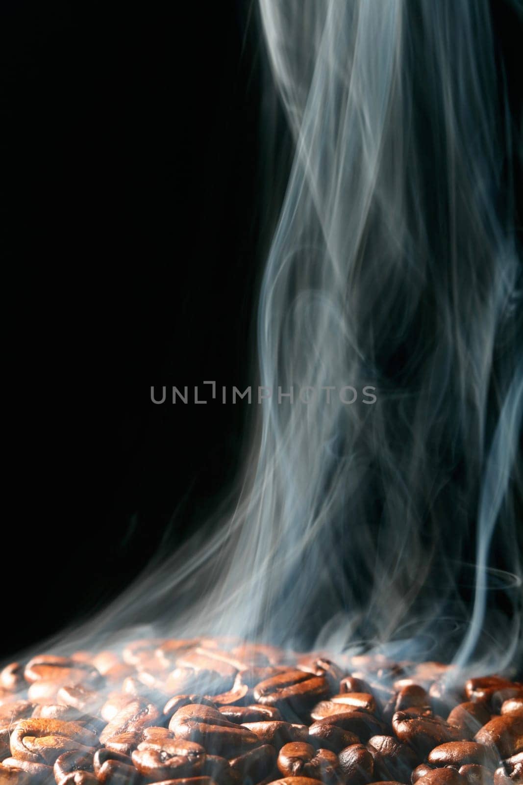 macro coffee beans in aroma smoke